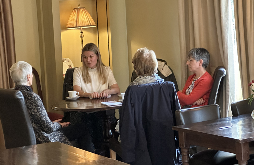 Laura with local residents discussing local issues