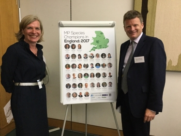 : Marian Spain, CE of Plantlife, and Richard Benyon MP with the list of MP Species Champions in England 2017.