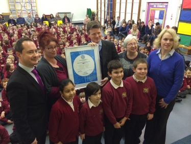 Richard Benyon MP presents UNICEF award.